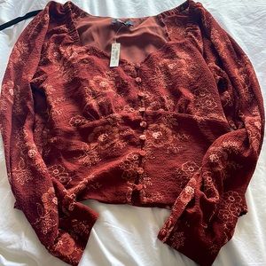 Madewell top with floral design, cropped, buttons down the front.